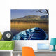 Row Boat Amongst Reeds On A Lake Wall Mural