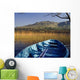 Row Boat Amongst Reeds On A Lake Wall Mural