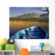 Row Boat Amongst Reeds On A Lake Wall Mural
