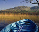 Row Boat Amongst Reeds On A Lake Wall Mural