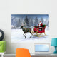 Reindeer pulling a sleigh with Santa Claus. Wall Mural