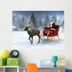 Reindeer pulling a sleigh with Santa Claus. Wall Mural