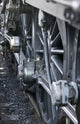 Close-Up Of Steam Engine Train Wheel Wall Mural