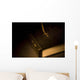 Gold Cross Pendant Resting On A Book Wall Mural