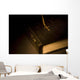 Gold Cross Pendant Resting On A Book Wall Mural