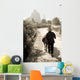 Man Walking Down Road With Water Buffalo Wall Mural