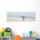 Person Walking On The Beach With A Fishing Net Wall Mural
