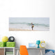 Person Walking On The Beach With A Fishing Net Wall Mural