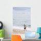 Person Walking On Beach With Fishing Net Wall Mural