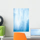 A frozen waterfall with ice in a blue and white color in winter Wall Mural