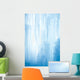 A frozen waterfall with ice in a blue and white color in winter Wall Mural