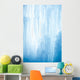 A frozen waterfall with ice in a blue and white color in winter Wall Mural