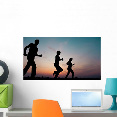Silhouettes Wall Mural shown on a wall