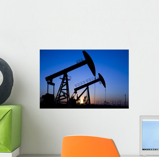 Silhouette of oil pump jacks Wall Mural