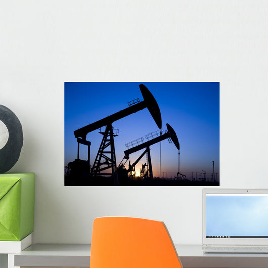 Silhouette of oil pump jacks Wall Mural