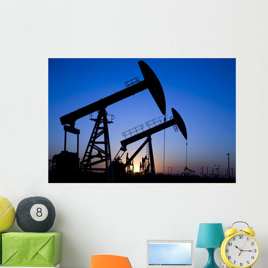 Silhouette of oil pump jacks Wall Mural