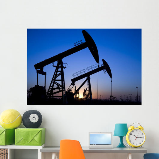 Silhouette of oil pump jacks Wall Mural