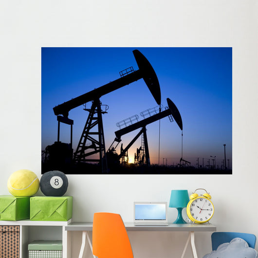 Silhouette of oil pump jacks Wall Mural