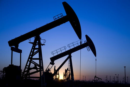 Silhouette of oil pump jacks Wall Mural