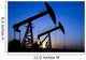 Silhouette of oil pump jacks Wall Mural