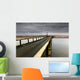 A Road Going Over Water Towards A Beach Wall Mural