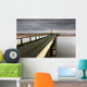 A Road Going Over Water Towards A Beach Wall Mural