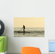 Surfer Steering Into Shore At Dusk Wall Mural