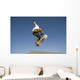 Low Angle View Of Young Male Skateboarder Wall Mural