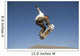Low Angle View Of Young Male Skateboarder Wall Mural