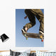 Low Angle View Of Young Male Skateboarder Wall Mural