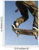 Low Angle View Of Young Male Skateboarder Wall Mural