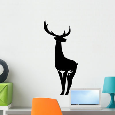 Deer Silhouette Wall Decal shown on a wall