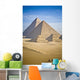 The Pyramids With Two Men On Camels Going By Wall Mural