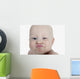 Baby Making A Funny Face Wall Mural