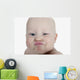 Baby Making A Funny Face Wall Mural