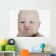 Baby Making A Funny Face Wall Mural