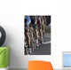 wheels during a cycling race Wall Mural