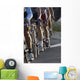 wheels during a cycling race Wall Mural