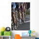 wheels during a cycling race Wall Mural