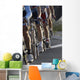 wheels during a cycling race Wall Mural