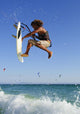 Young Man Kite Surfing Wall Mural