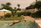 Woman Diving Into Swimming Pool Wall Mural