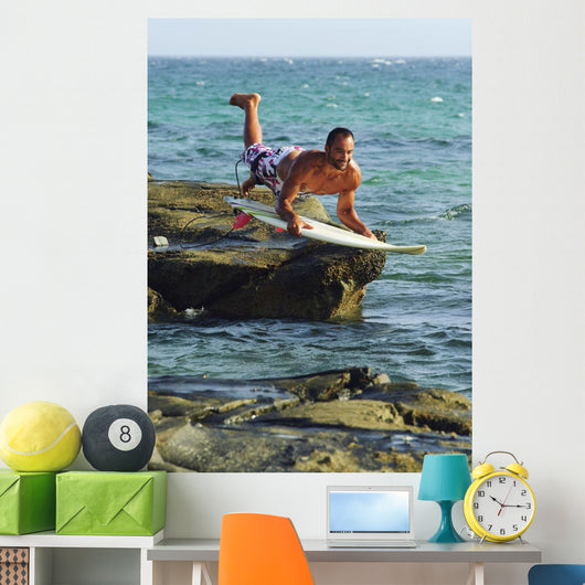 Man Jumping Into The Water On His Surf Board Wall Mural
