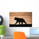 Young Grizzly Bear Walks Along Edge Of Lake At Sunset Wall Mural