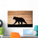 Young Grizzly Bear Walks Along Edge Of Lake At Sunset Wall Mural