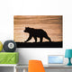 Young Grizzly Bear Walks Along Edge Of Lake At Sunset Wall Mural