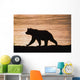 Young Grizzly Bear Walks Along Edge Of Lake At Sunset Wall Mural