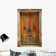 Old door with gold ornaments Wall Mural