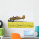 Crop Duster Spraying Flowering Canola Field Wall Mural