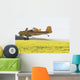 Crop Duster Spraying Flowering Canola Field Wall Mural